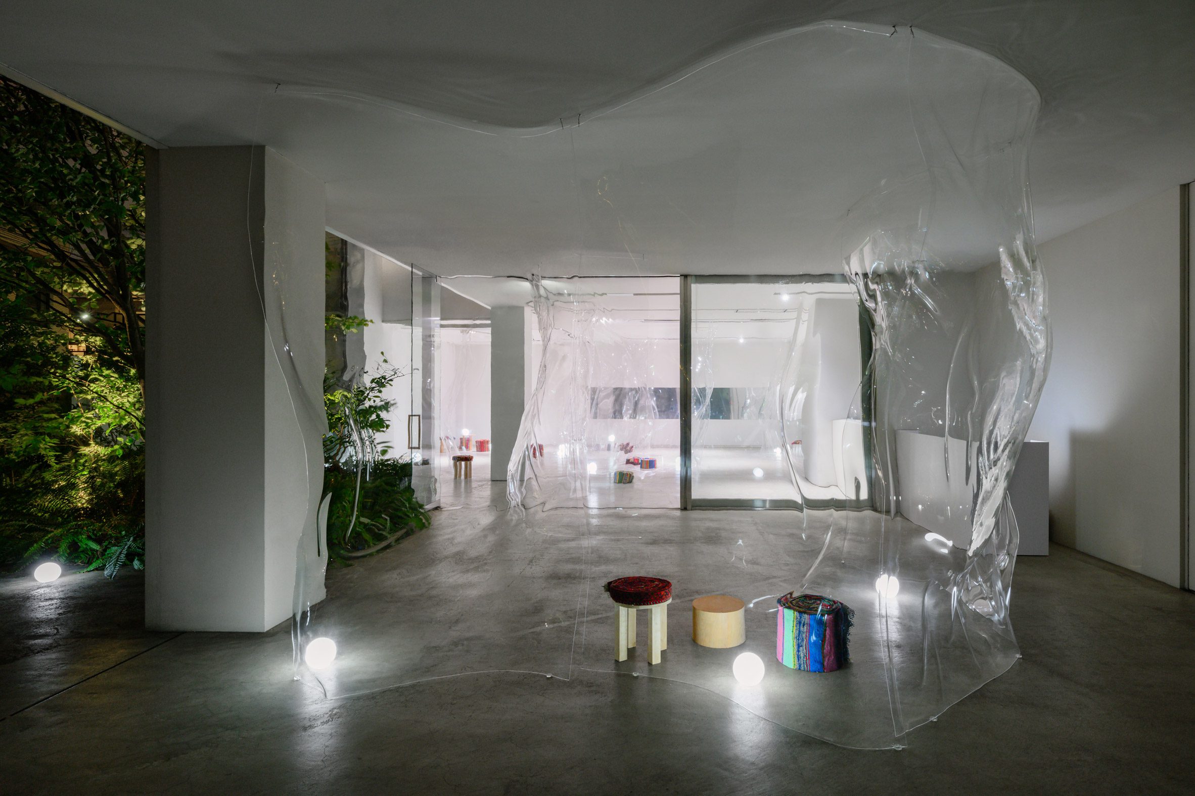 Evening in bar space with transparent walls