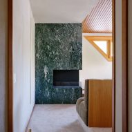 Marble fireplace in Co.arch Studio apartment renovation in Mario Galvagni's Giomein