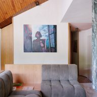 Sofa conversation pit in Co.arch Studio apartment renovation in Mario Galvagni's Giomein
