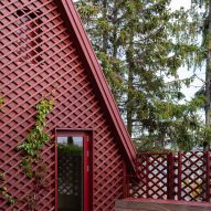 Extension with red latticework facade