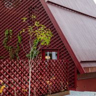 House extension with red latticework