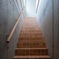 Brick staircase with concrete walls