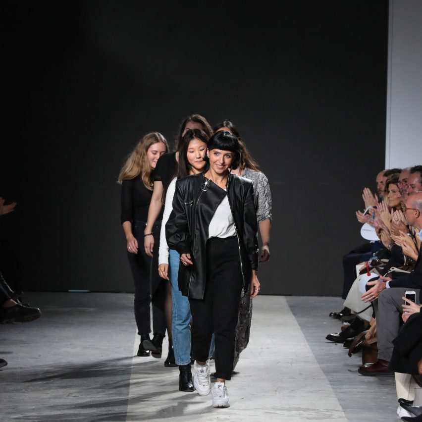photo of students walking a runway