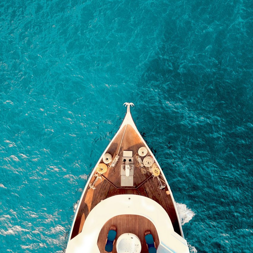 an image of a boat on water from above