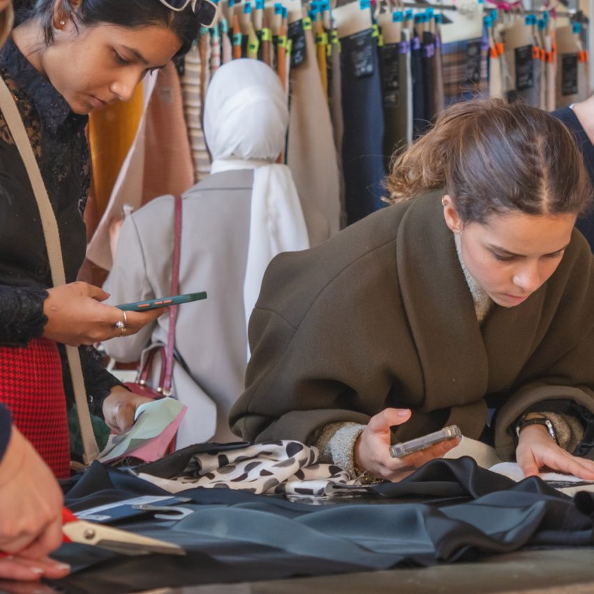 photo of students looking at fabrics