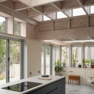 Kitchen island and glazing in Tabberner Cook House by James Alder Architects