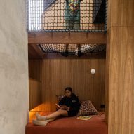 Sam Crawford reorganises 1950s Sydney home around multifunctional staircase