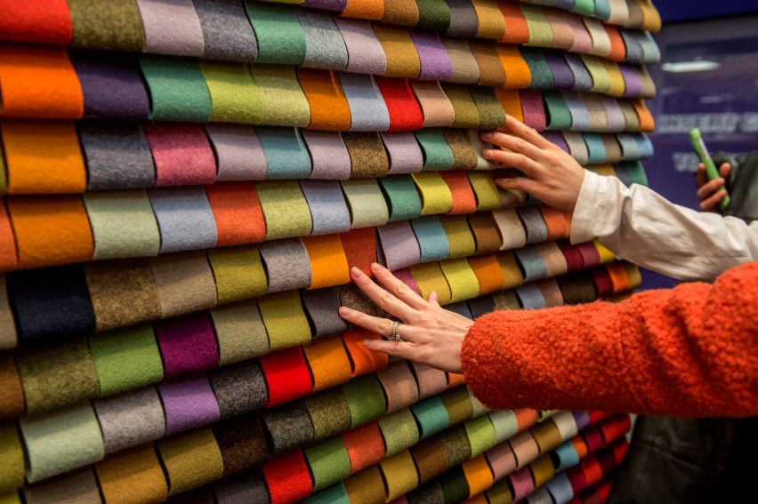 Photo of people touching fabric samples