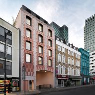 Bureau de Change enlivens Trace apartment block with pink waste-based panels