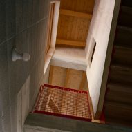 Red balustrade in Casa BM by Errant Architetture