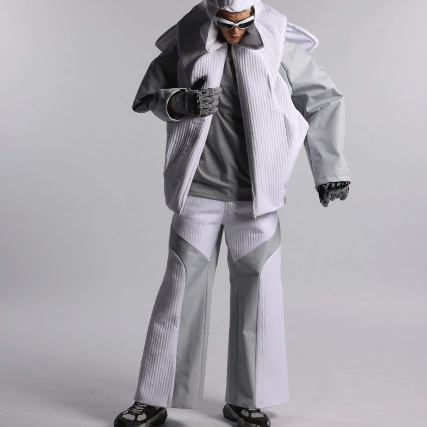 a model wearing grey clothing