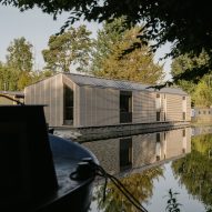 View across canal of Float House by TiggColl