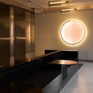 Circular light in front of black table