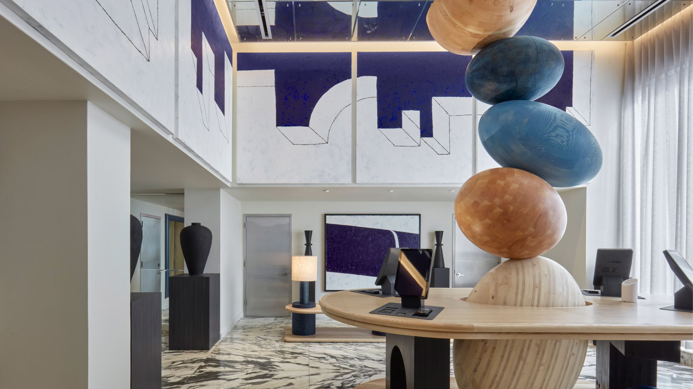 Jan Hendzel designs towering timber sculpture for Hotel Park Ave