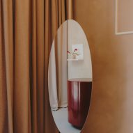 Rounded mirror in reception area