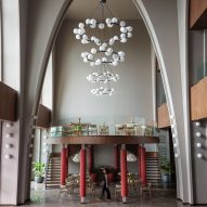 Meditative lighting and Banarasi brocade panels decorate Jain community hall in Kolkata