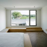 Guest bedroom with wooden finishes