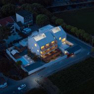 Guesthouse from above illuminated at night