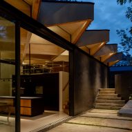 Overhanging triangular eaves of Arbour House by Andrei Saltykov