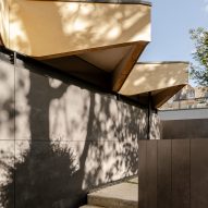 Overhanging triangular eaves of Arbour House by Andrei Saltykov