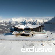 Italian Alpine peak topped with jagged cable car station