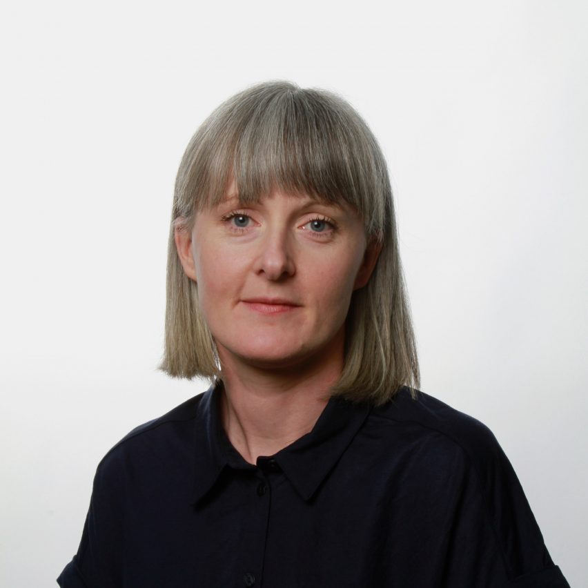 a photograph of a person in black clothing