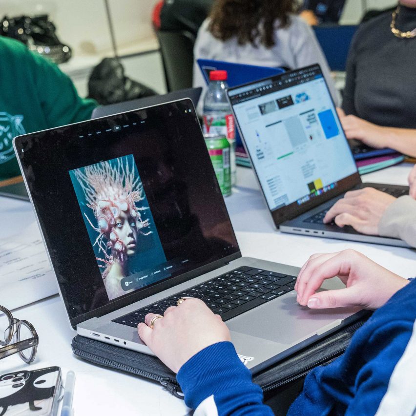 laptop with digitial art on screen
