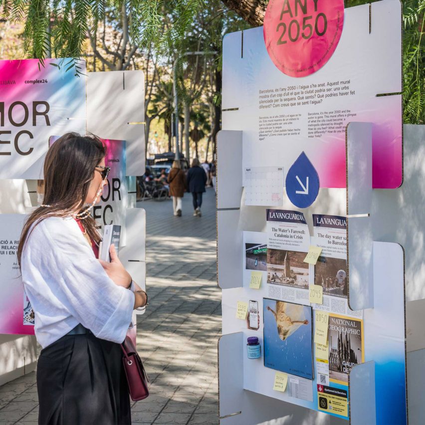 person looking at display board
