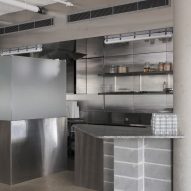 Kitchen with concrete and metal surfaces