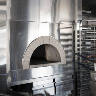 Kitchen with concrete and metal surfaces