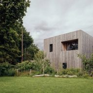 Larch-clad exterior of Orchard House designed by Studio Bark