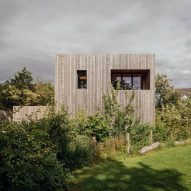 Larch-clad exterior of Orchard House designed by Studio Bark