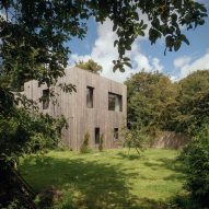 Larch-clad exterior of Orchard House designed by Studio Bark