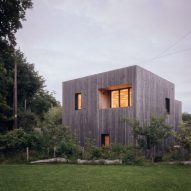 Larch-clad exterior of Orchard House designed by Studio Bark