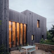 Larch-clad exterior of Orchard House designed by Studio Bark