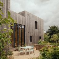 Larch-clad exterior of Orchard House designed by Studio Bark