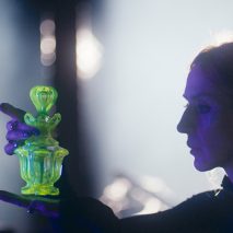 Woman holding crystal bottle