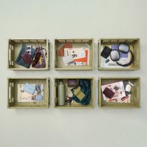 Small everyday items grouped in baskets
