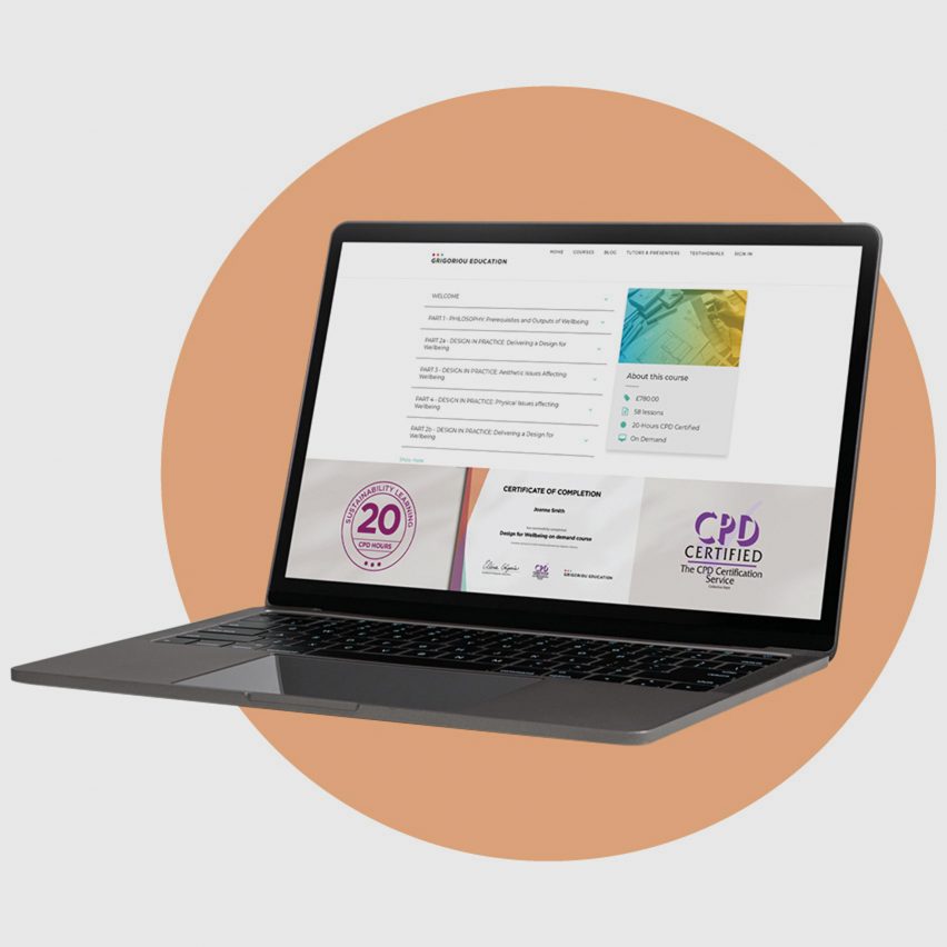 an image of a laptop with an orange graphic behind it