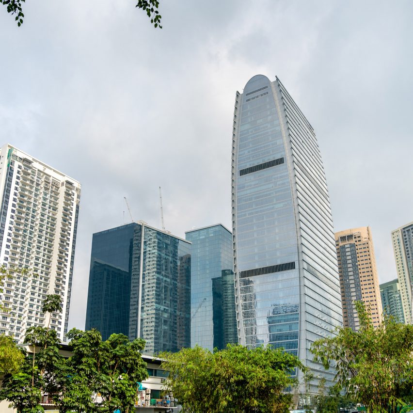an image of city buildings against a blue sky