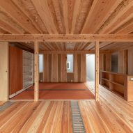 Sliding bookshelf walls in Live Sawn House by ICADA