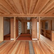 Sliding bookshelf walls in Live Sawn House by ICADA