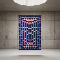 Display of rug made out of discarded yarn