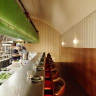 Daytrip creates "atmospheric and slightly cinematic" interior for Cafe Kowloon