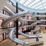 Bernard Tschumi Architects winds helical slides through school science centre