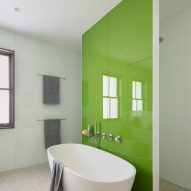 Green glass backed bathroom