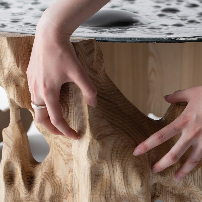 a photograph of a person handling woodwork