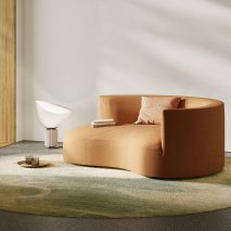 Orange-toned rounded sofa