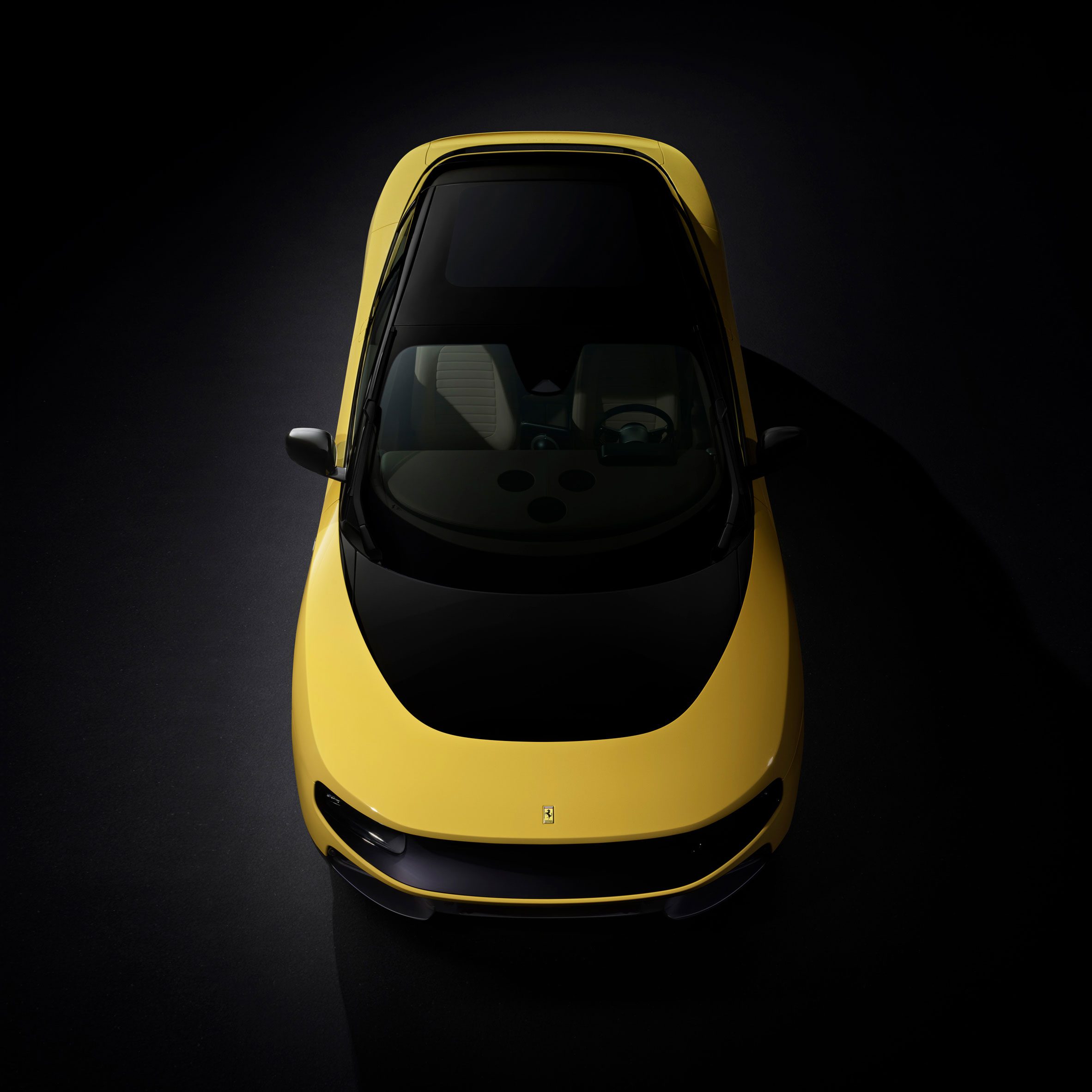 Aerial view of yellow Ferrari Luce