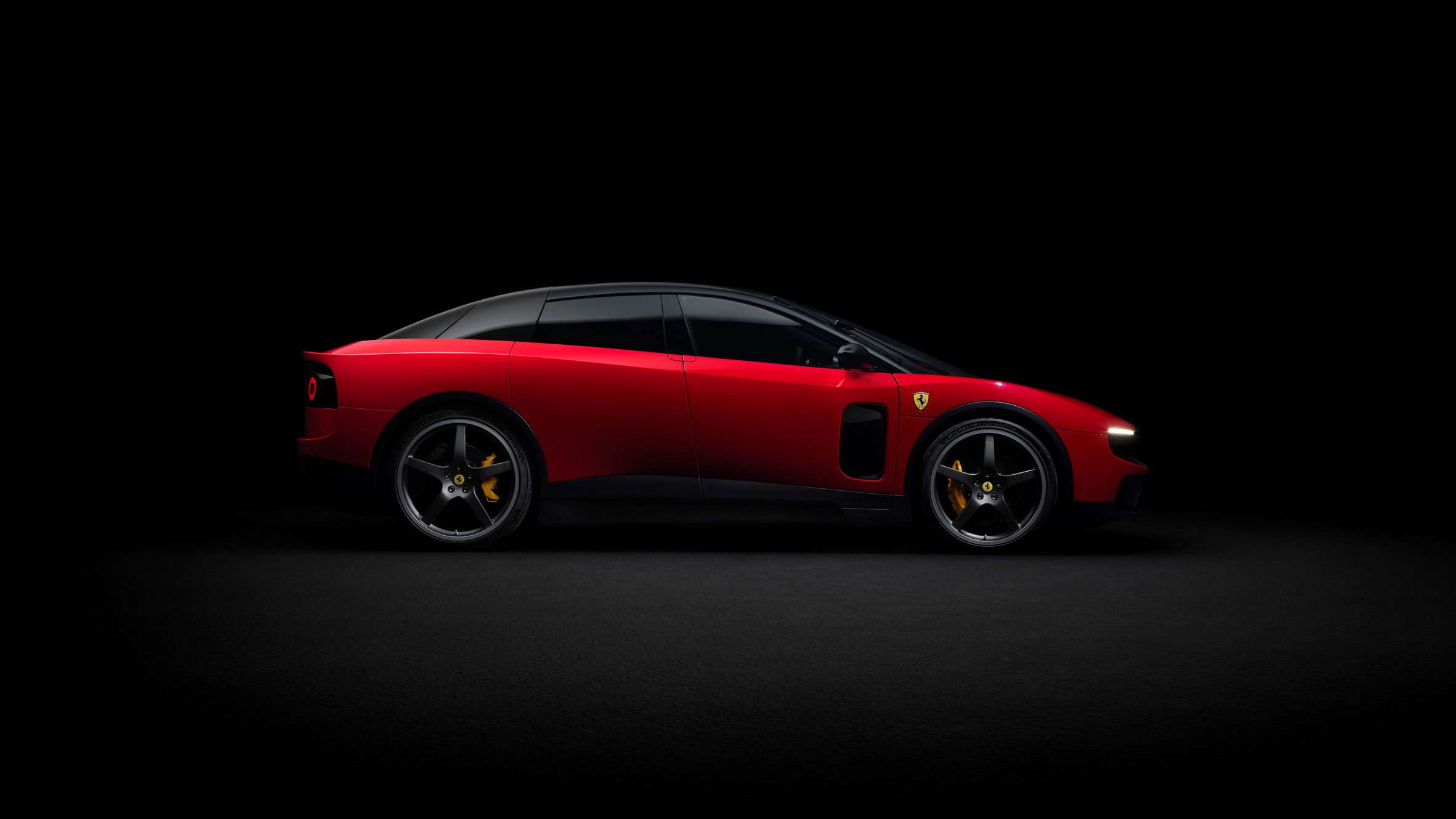 Side view of red Ferrari Luce